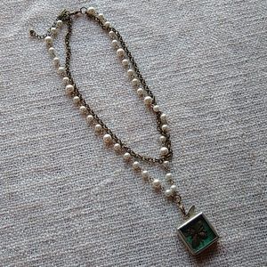 Pearl and brass necklace